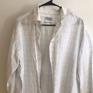 Men’s plaid, collared, button up dress shirt.